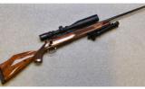 Weatherby, Model Mark V Deluxe Bolt Action Rifle, .30-06 Springfield - 1 of 9