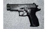 Sig Sauer P226 Elite
.9MM Luger - 2 of 2