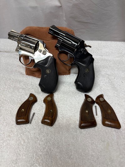 TWO Smith & Wesson Model 36 revolvers no dash one blue 7 one nickel W/ Two sets grips