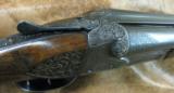 Winchester M21 Trap Grade
Custom
Fantastic engraving - 3 of 14
