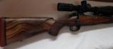CUSTOM BUILT 1000 YARD RIFLE STOCKED BY STERLING DAVENPORT METAL BY LARRY SMART - 2 of 18
