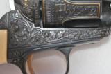 OUTSTANDING COLT SAA
ENGRAVED BY ARNOLD GRIEBEL IN CUSTOM MAPLE DISPLAY CASE - 16 of 20