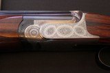 ONE OF THREE PERAZZI 20 GA SMALL FRAME GAME GUNS EVER MADE ENGRAVED BY IORA.
SC4 GRADE - 15 of 20