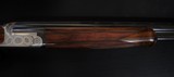 ONE OF THREE PERAZZI 20 GA SMALL FRAME GAME GUNS EVER MADE ENGRAVED BY IORA.
SC4 GRADE - 7 of 20
