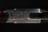 ONE OF THREE PERAZZI 20 GA SMALL FRAME GAME GUNS EVER MADE ENGRAVED BY IORA.
SC4 GRADE - 11 of 20