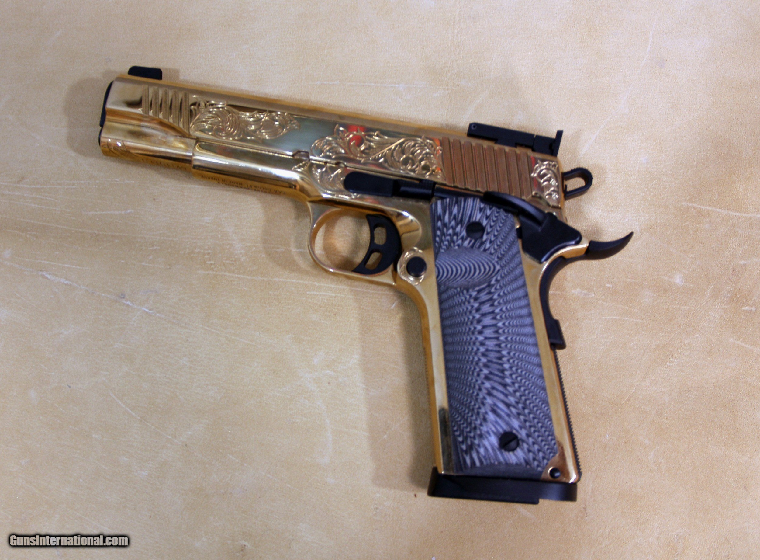 Girson, 1911 Gold Plated and engraved 45 ACP with case.