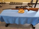 Browning A Bolt 22cal. with rare laminated stock with Redfield 3X-9X Tracker Scope. - 1 of 13