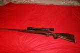 Remington Model 700 bolt action varmint rifle. - 1 of 14