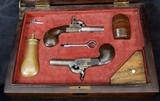 Cased pair of French Screw Barrel Percussion Pistols - 5 of 13