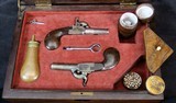 Cased pair of French Screw Barrel Percussion Pistols - 12 of 13