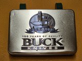 Buck 112 with tin. - 1 of 2