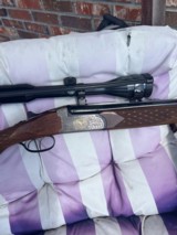 Franz Sofia 7X57R X 16ga CombinationO/U Scope in claw mounts - 1 of 3