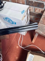 Franz Sofia 7X57R X 16ga CombinationO/U Scope in claw mounts - 3 of 3