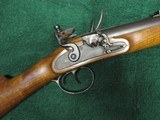 12 bore
double rifle by G.B. 