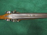 12 bore
double rifle by G.B. 