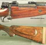 HOLLAND & HOLLAND 338- MAUSER- A LOT of ENGRAVING- FULL MANNLICHER STOCK- 20" Bbl.- OPEN SIGHTS- ORIG H&H QD SINGLE LEVER MOUNTS - 3 of 7