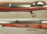 J. P. SAUER 30-06- MADE in 1930- COMMERCIAL MAUSER ACTION- HALF ROUND HALF OCTAGON w/a FULL LENGTH MACHINED INTEGRAL RIB- BORE as NEW - 3 of 5
