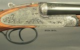 RIGBY 470 N. E. LONDON SIDELOCK EJECTOR- LONDON PROOF 1998- 90% COVERAGE of FLORAL & 3 AFRICAN GAME ANIMALS- EXC. WOOD- OVERALL REMAINS at 98%- CASED - 6 of 8