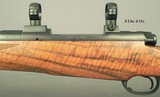 DAKOTA 280 REM. CLASSIC DELUXE GRADE- LIKE a SAFARI GRADE- UPGRADE FIDDLEBACK WALNUT- APPEARS UNFIRED- COND. at 99%- LEUPOLD TYPE BASES & RINGS- NICE - 2 of 5