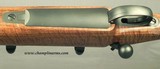 DAKOTA 280 REM. CLASSIC DELUXE GRADE- LIKE a SAFARI GRADE- UPGRADE FIDDLEBACK WALNUT- APPEARS UNFIRED- COND. at 99%- LEUPOLD TYPE BASES & RINGS- NICE - 3 of 5