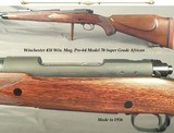 WINCHESTER 458 WIN. MAG. MOD 70 PRE-64 SUPER GRADE AFRICAN- 98% BLUE OVERALL- ORIG. WOOD FINISH at 97%- 1957- THE BORE is EXC.- SLING SWIVELS - 1 of 5