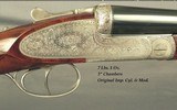 GRULLA 12 SIDELOCK EJECT MOD. 215- 28" CHOPPER LUMP Bbls.- ROSE & SCROLL ENGRAVING- NICE WOOD- ENGLISH STOCK at 14 7/8"- OVERALL 98%- MADE 1 - 2 of 5