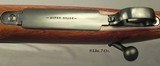 WINCHESTER 375 H&H SUPER GRADE MODEL 70 PRE-64- 1949- A VERY SOLID WORKING RIFLE- THE BORE is as NEW- SOLID STOCK INSIDE & OUT- EXC. MECHANICS - 4 of 6