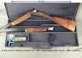 B. RIZZINI 28 & 410- BOTH BBLS. 28"- O/U MOD UPLAND EL CLASSIC- CASE COLOR RECEIVER- VERY NICE WOOD - Dbl. TRIGGERS- 100% COND.- 1997-6 Lbs. 6 Oz - 1 of 7