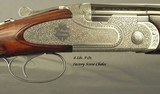 BERETTA 1999 20 BORE JUBILEE GALLERY PREMIUM GRADE- OUTSTANDING WOOD- EXC. ENGRAVING of ROSE & SCROLL- SIDEPLATES- 28" BARRELS- CASED- 6 Lbs. 9 O - 3 of 7