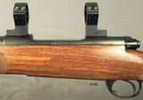 BIESEN 7mm REM. MAG.- COMPLETE CUSTOM with a 1947 PRE-64 MOD. 70 ACTION- A TRUE BIESEN CLASSIC STOCK- WRAP AROUND FLEUR-DE-LIS CHECKERING- OVERALL 98% - 3 of 8