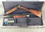 B. RIZZINI 28 & 410- BOTH BBLS. 28"- O/U MOD UPLAND EL CLASSIC- CASE COLOR RECEIVER- VERY NICE WOOD - Dbl. TRIGGERS- 100% COND.- 1997- 6 Lbs. 6 O - 1 of 7