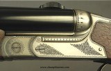 HEYM 500 3" N. E. MOD 88B SAFARI (NOT a PH MOD)- 40% ENGRAVING- CLAW MOUNTS w/ ZEISS 1.5 x 6- 24" EJECT Bbls.- BOLSTERED FRAME- 98% - 4 of 7