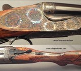 GRIFFIN & HOWE 500 3" N. E. DOUBLE RIFLE- CONTINENTAL MODEL BOXLOCK- 23" EJECT CHOPPER LUMP Bbls.- 95% ENGRAVING- EXC. WOOD- 97% COND.- 2005 - 2 of 5