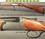 B. RIZZINI 20 BORE- O/U MODEL ROUND BODY DELUXE- SATIN FINISH RECEIVER- VERY NICE WOOD- SINGLE SELECTIVE TRIGGER- 6 SCREW CHOKES- ENGLISH STOCK - 1 of 5