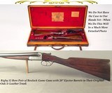 RIGBY 12 BORE PAIR of BOXLOCKS
CONSECUTIVE #'s
ORIG. OAK & LEATHER TRUNK
28" EJECT Bbls.
DOLLS HEAD THIRD BITE
BOTH I.C. & M
EXC. BORES