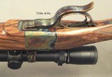 DAKOTA 300 WIN. MAG. FACTORY DELUXE MODEL 10 S S- EXC ENGLISH WALNUT- REMAINS as NEW- CASE COLORED ACTION- LEUPOLD 4.5 x 14- CASE COLORED - 4 of 5
