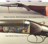 WEBLEY & SCOTT 450 #2 N. E.
28" EXTRACT CHOPPER LUMP Bbls.
DOLLS HEAD THIRD BITE
PROPER WEIGHT at 11 Lbs. 3 Oz.
VERY GOOD BORES
SOLID WOOD