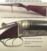 SAUER 12 from PRUSSIA- 30% ENGRAVING with GAME BIRDS- 28" EJECT KRUPP Bbls.- 95% ORIG BRIGHT & VIVID CASE COLORS- OVERALL EXC COND-100% CC BREECH