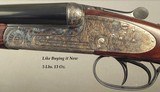 AYA 28 ROUND ACTION SIDELOCK EJECT MOD No. 2- MADE in 2005- 98% COVERAGE of SCROLL- DOUBLE TRIGGERS- 27" CHOPPER LUMP Bbls.- 99% COND.- STRAIGHT - 2 of 5
