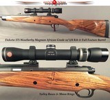 DAKOTA 375 WEATHERBY MAG AFRICAN GRADE- REMAINS in EXC PLUS COND- EXC ENGLISH WALNUT- 1/4 RIB w/ OPEN SIGHTS- LEICA 1.75 x 6- TALLEY BASES & RINGS