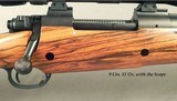 DAKOTA 375 WEATHERBY MAG AFRICAN GRADE- REMAINS in EXC PLUS COND- EXC ENGLISH WALNUT- 1/4 RIB w/ OPEN SIGHTS- LEICA 1.75 x 6- TALLEY BASES & RINGS - 2 of 5