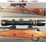 DAKOTA 375 WEATHERBY MAG AFRICAN GRADE- REMAINS in EXC PLUS COND- EXC ENGLISH WALNUT- 1/4 RIB w/ OPEN SIGHTS- LEICA 1.75 x 6- TALLEY BASES & RINGS - 1 of 5
