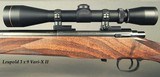 COOPER 22 HORNET MODEL 40- UNFIRED- LEUPOLD 3 x 9- 24