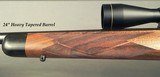 COOPER 22 HORNET MODEL 40- UNFIRED- LEUPOLD 3 x 9- 24