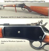 WINCHESTER MOD 71 DELUXE- 348 W.C.F.- ORIG PIECE- MADE 1941- BORE LIKE NEW- 94% RECEIVER BLUE- 95% Bbl. BLUE- 96% WOOD FINISH- FACTORY BOLT PEEP SIGHT