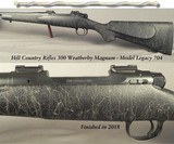 HILL COUNTRY RIFLE .300 WTHBY MAG
MOD LEGACY 704
26" BENCHMARK SS 1 in 10" TWIST Bbl.
TRIGGERTECH TRIGGER
PILLAR & GLASS BEDDED
McMILLAN STOCK