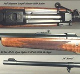 RIGBY 375 H&H- DOUBLE SQUARE MAUSER M98 MAG ACTION- SUPERB FLOORPLATE ENGRAVING- EXC WOOD- SWAROVSKI w/ QD PIVOT MOUNTS- BUILT in 2015- OVERALL 97% - 7 of 10