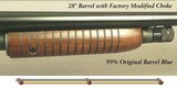 WINCHESTER MODEL 12 FEATHERWEIGHT with a AAA DELUXE WINCHESTER CHECKERED BUTTSTOCK -OVERALL ORIG BLUE at 99% -THE WOOD at 97% -TOTALLY APPEARS UNFIRED - 5 of 5