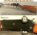 WINCHESTER MODEL 71 DELUXE - 1957 - BARREL BLUE 100% - RECEIVER BLUE - 99% - WOOD 98% - BORE as NEW - SLING SWIVELS - PEEP SIGHT - SUPER NICE! - Image 1 of 6