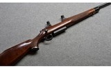 Remington~700 Engraved~.375 Remington Ultra Magnum - 1 of 10